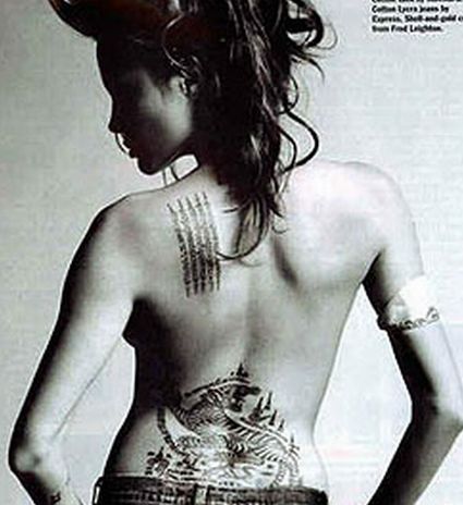 tattoo on back girl. tribal tattoo dragon ack